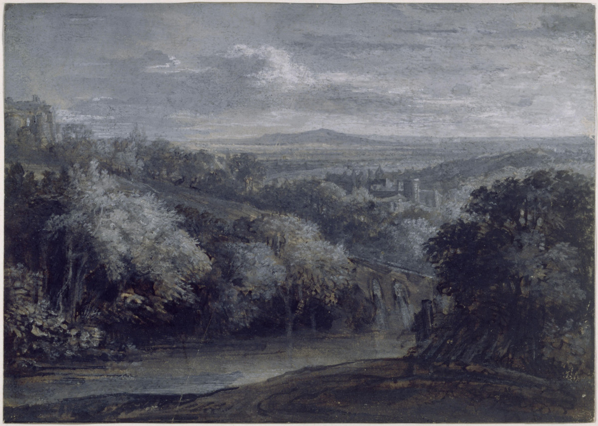 Weite Landschaft mit Stadt im Hintergrund